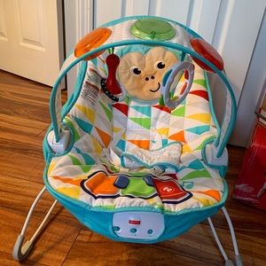Fisher Price music and lights bouncy seat